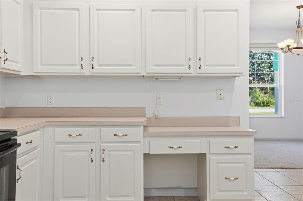 16 Nephthytis Court Homosassa, FL 34446 - Photo 18 of 45 a view white cabinets and a wooden floor