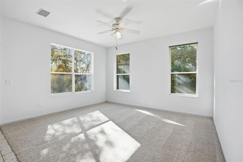 16 Nephthytis Court Homosassa, FL 34446 - Photo 21 of 45 an empty room with windows and closet