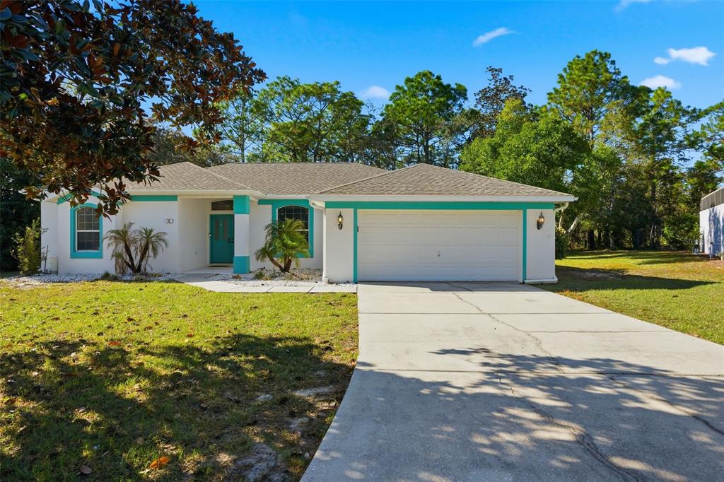 16 Nephthytis Court Homosassa, FL 34446 - Photo 43 of 45 a front view of a house with a yard