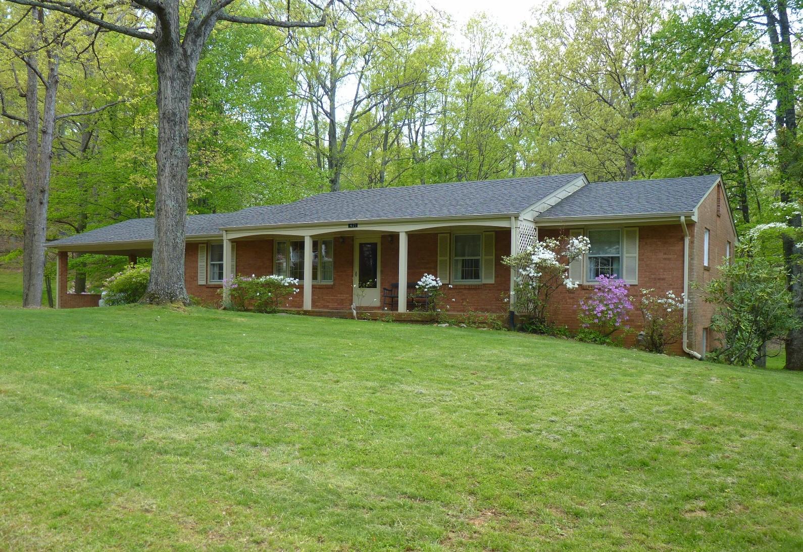 471 Pin Oak Drive Blue Ridge, VA 24064 - Photo 1 of 18 front view of a house with a yard