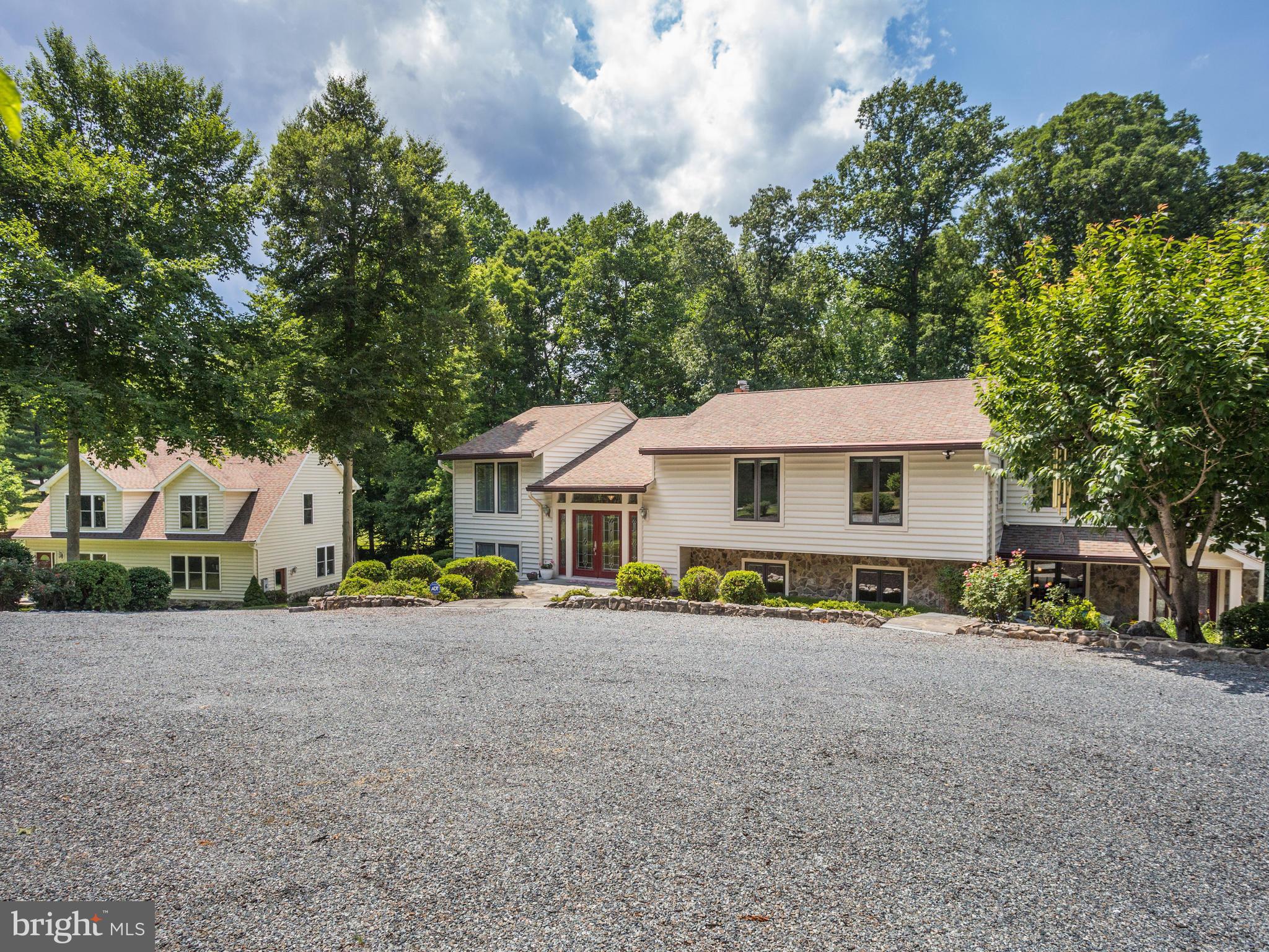 5820 Huntingtown Road Huntingtown, MD 20639 - Photo 2 of 30 3 car detached garage, mature landscaping.