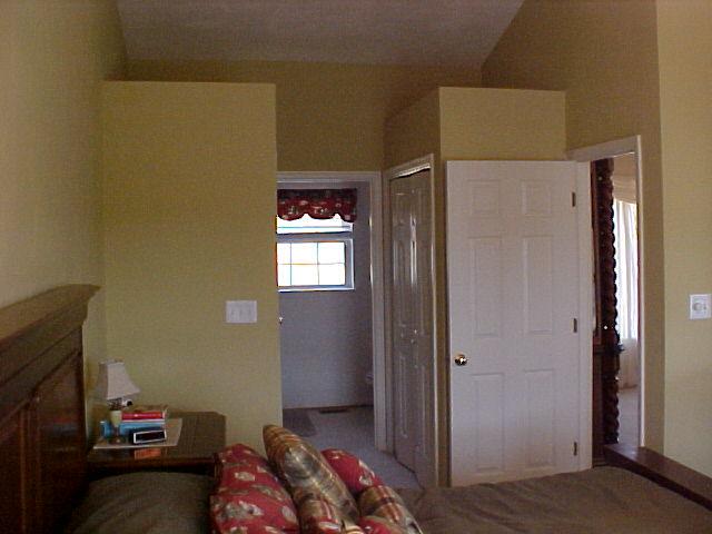 1762 Meadows Road Vinton, VA 24179 - Photo 10 of 12 a bedroom with a bed and a tv
