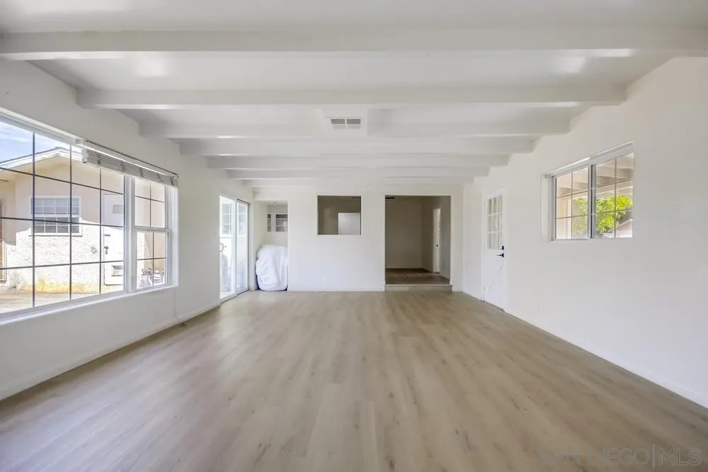 12224 Lemon Crest Drive Lakeside, CA 92040 - Photo 12 of 61 wooden floor in an empty room with a window