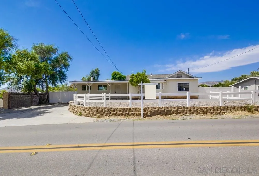 12224 Lemon Crest Drive Lakeside, CA 92040 - Photo 2 of 61 a front view of a house with a garden