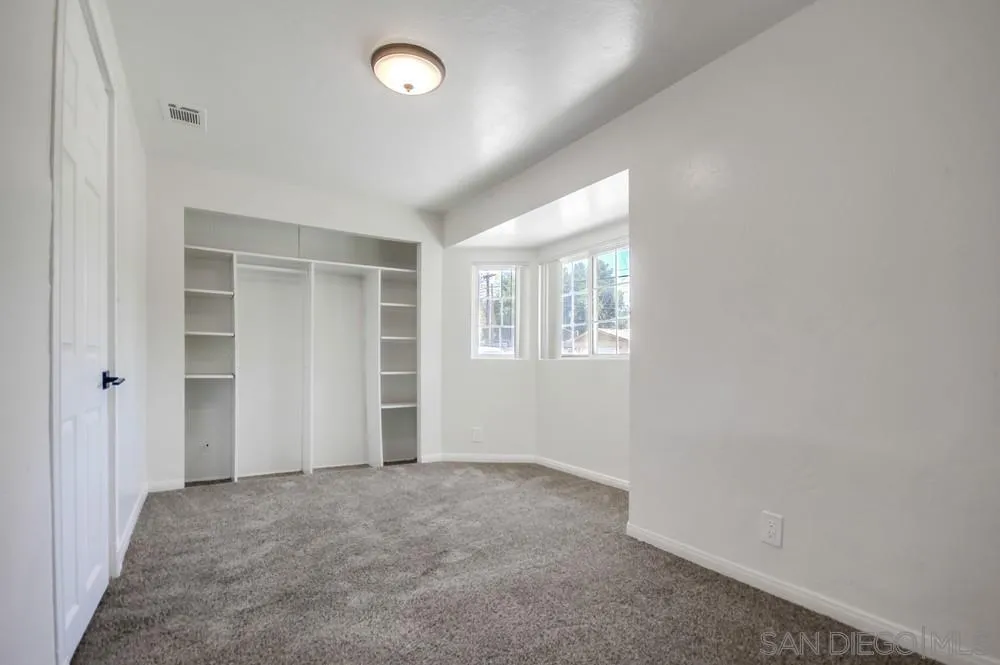 12224 Lemon Crest Drive Lakeside, CA 92040 - Photo 30 of 61 an empty room with windows
