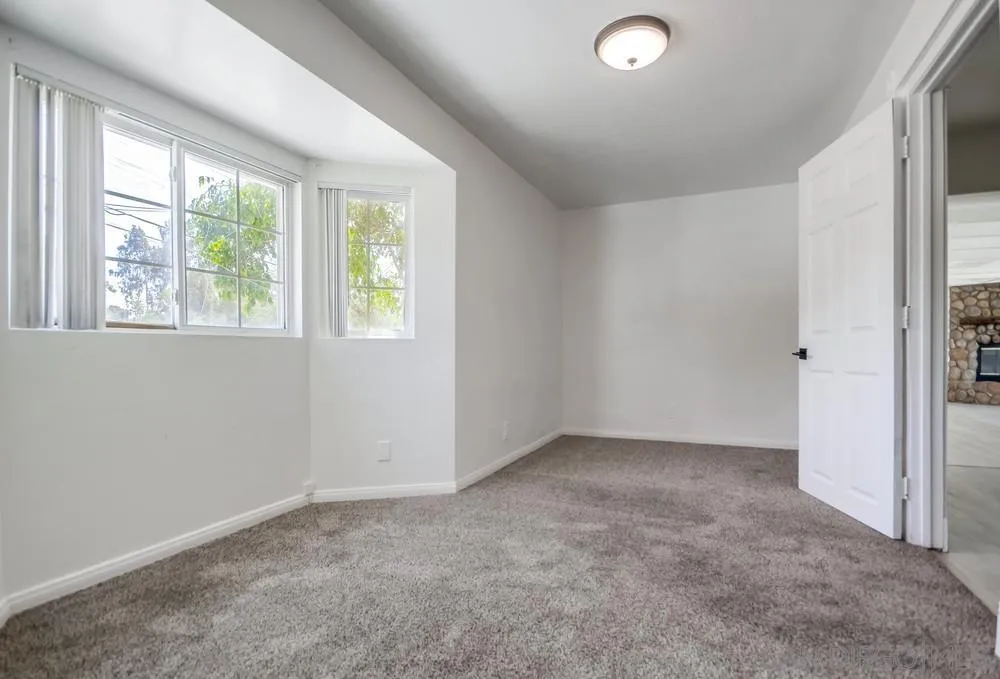 12224 Lemon Crest Drive Lakeside, CA 92040 - Photo 32 of 61 an empty room with windows
