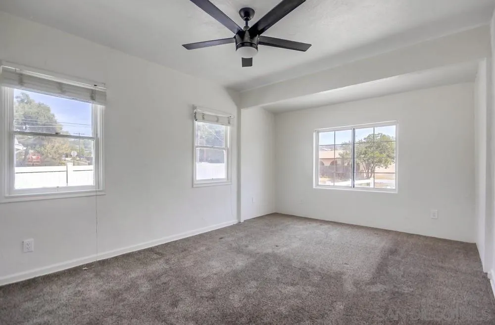 12224 Lemon Crest Drive Lakeside, CA 92040 - Photo 33 of 61 a view of a livingroom with a ceiling fan and window