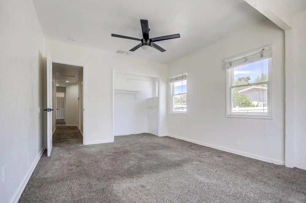 12224 Lemon Crest Drive Lakeside, CA 92040 - Photo 34 of 61 a view of a livingroom with a ceiling fan and window