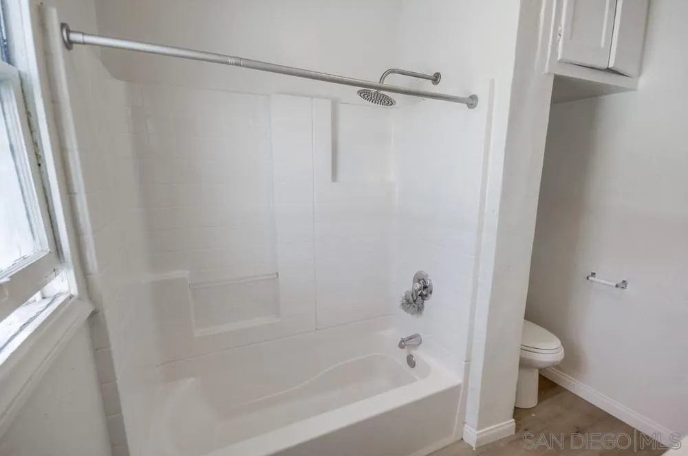 12224 Lemon Crest Drive Lakeside, CA 92040 - Photo 44 of 61 a bathroom with a bathtub and a shower