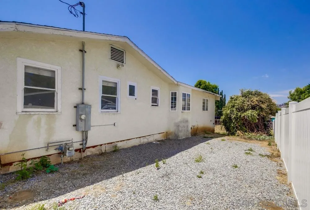 12224 Lemon Crest Drive Lakeside, CA 92040 - Photo 48 of 61 a front view of a house with a yard
