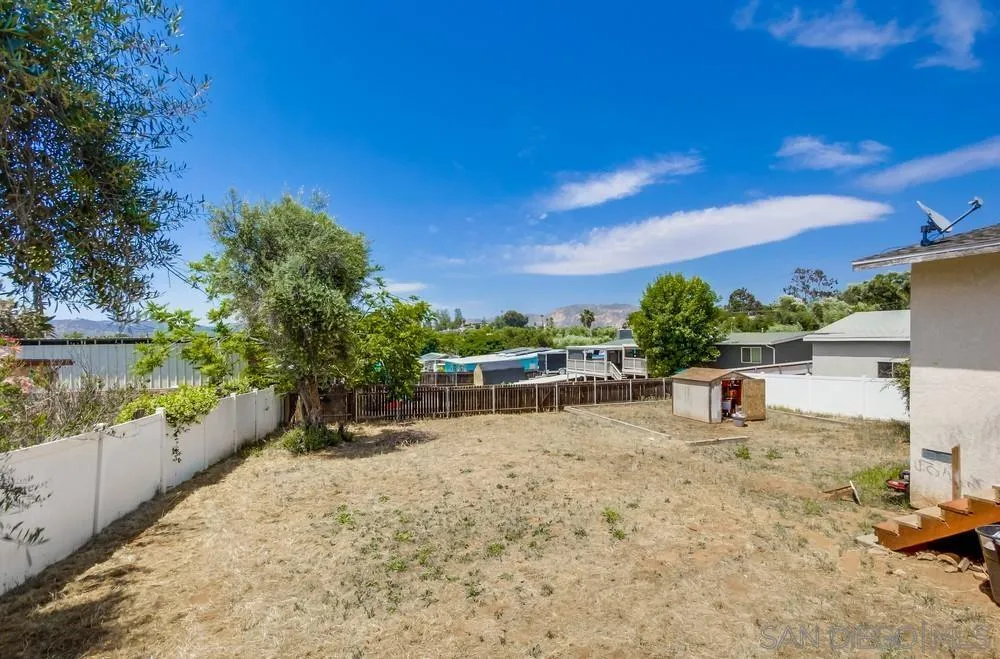 12224 Lemon Crest Drive Lakeside, CA 92040 - Photo 57 of 61 a view of a lake with a house in the background