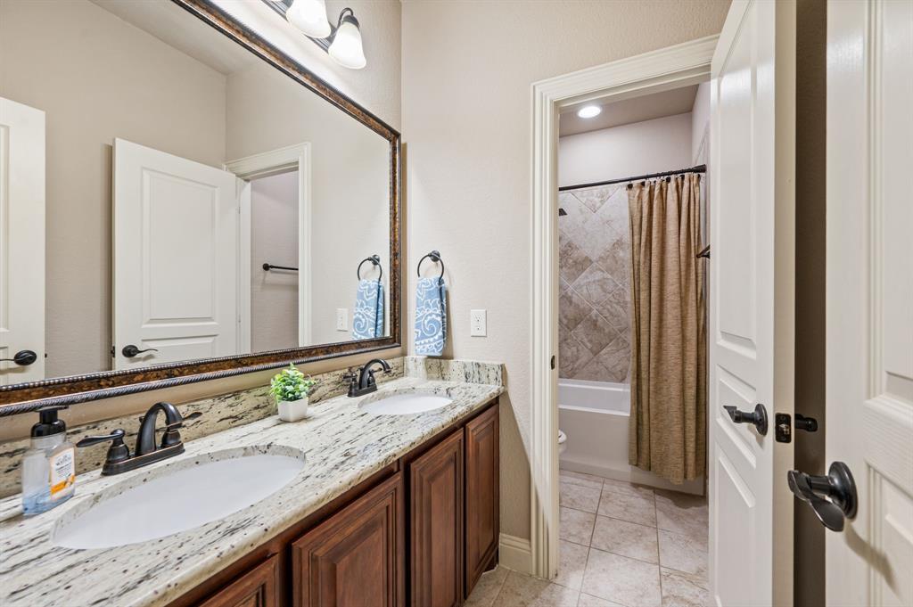 5209 Edgebrook Way Fort Worth, TX 76244 - Photo 21 of 33 a bathroom with a granite countertop sink mirror and double