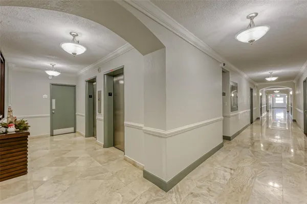 a view of a swimming pool and an outdoor seating