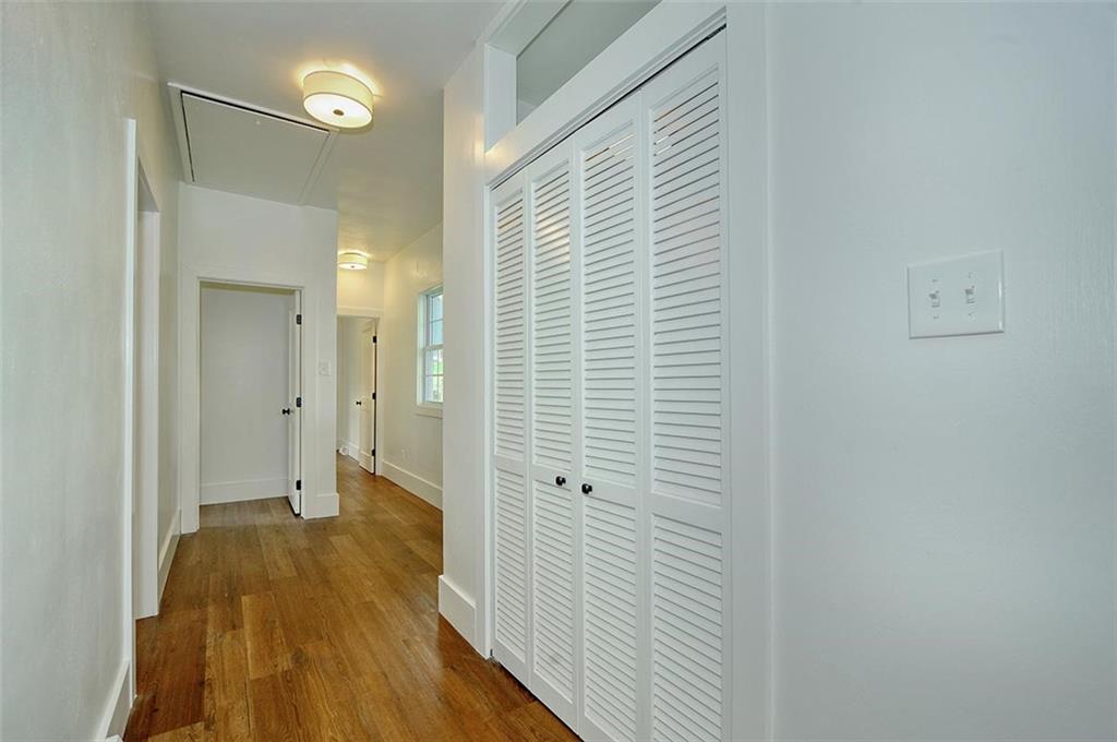 113 3rd Street Houston, PA 15342 - Photo 20 of 27 a view of a hallway with wooden floor and closet area