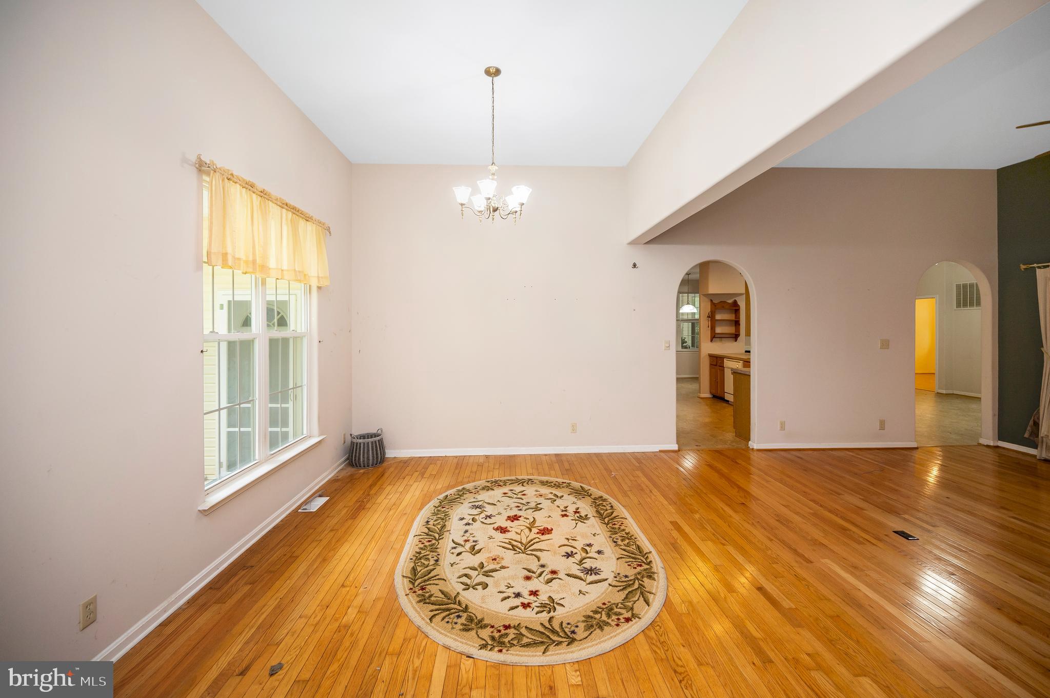 319 Richland Road Fredericksburg, VA 22406 - Photo 10 of 52 Right archway goes to family room.