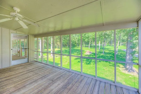 a swimming pool with outdoor seating