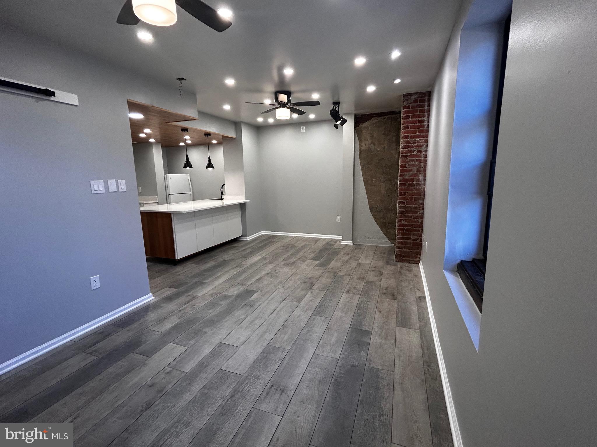 1601 Spring Garden Street, Unit 502 Philadelphia, PA 19130 - Photo 2 of 18 a view of a room with wooden floor