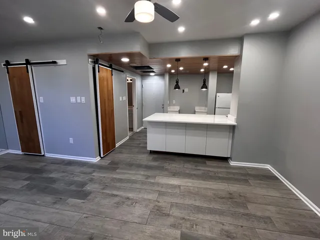 a view of a hallway with entryway