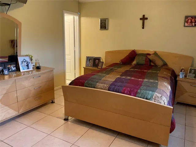 a living room with a couch and a flat screen tv