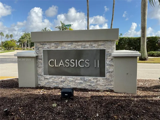 a sign board with a house