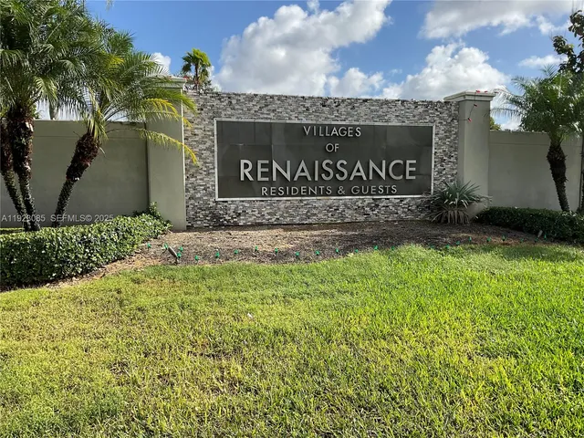 a view of outdoor space with garden and trees