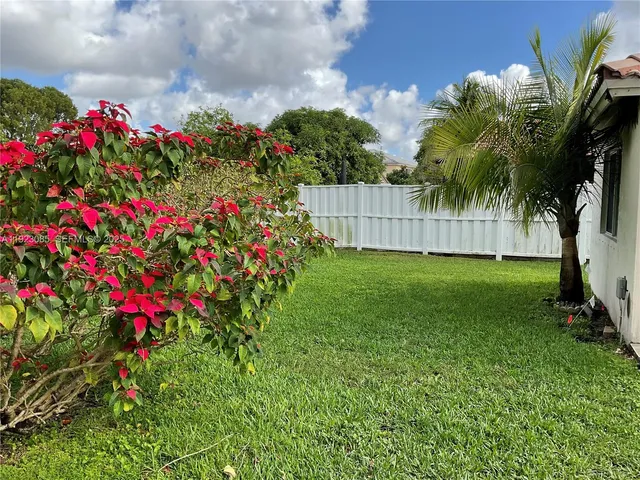 a view of a garden with flowers