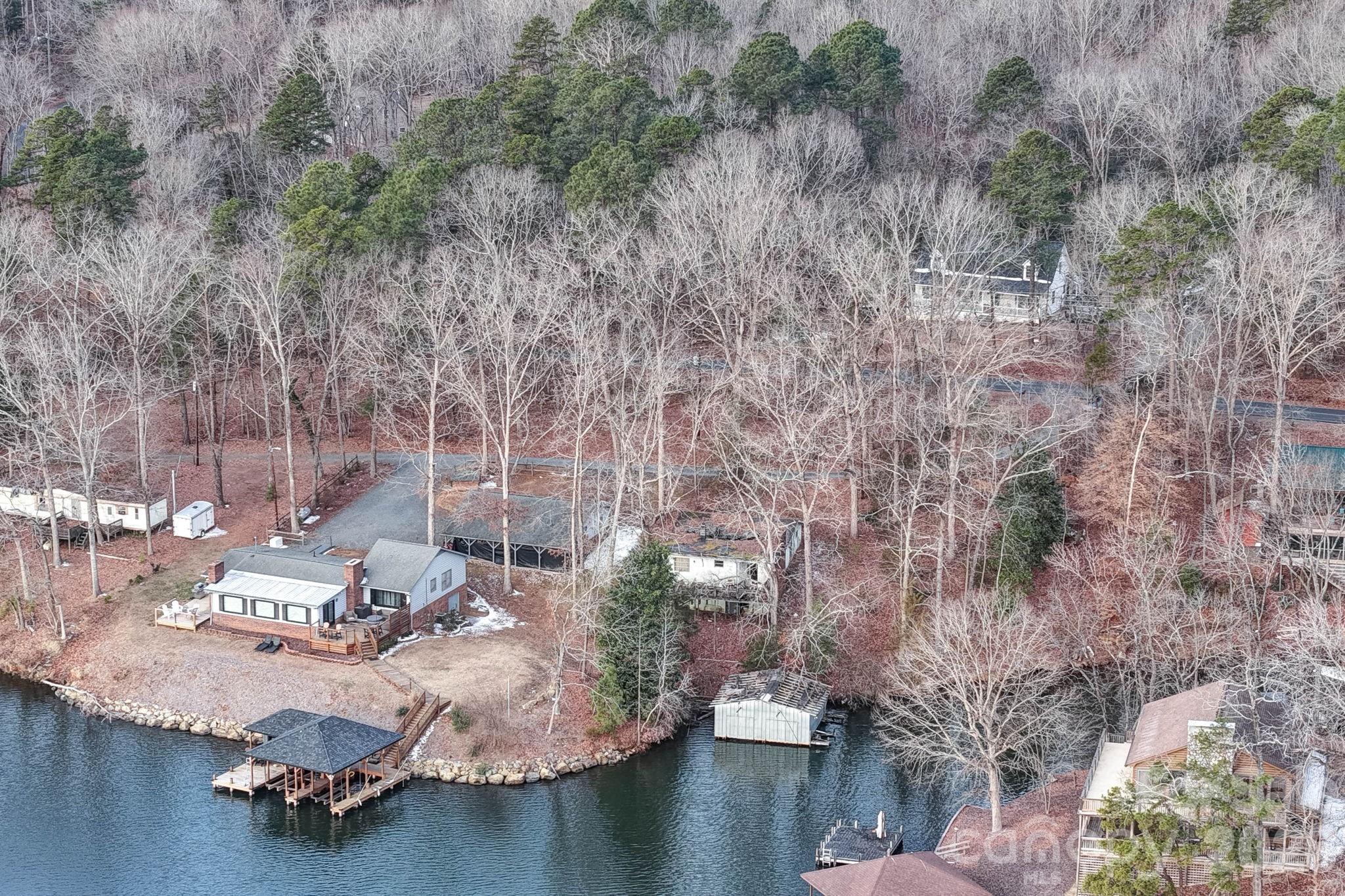49611 Waterview Trail Albemarle, NC 28001 - Photo 11 of 22 a view of a houses with a yard