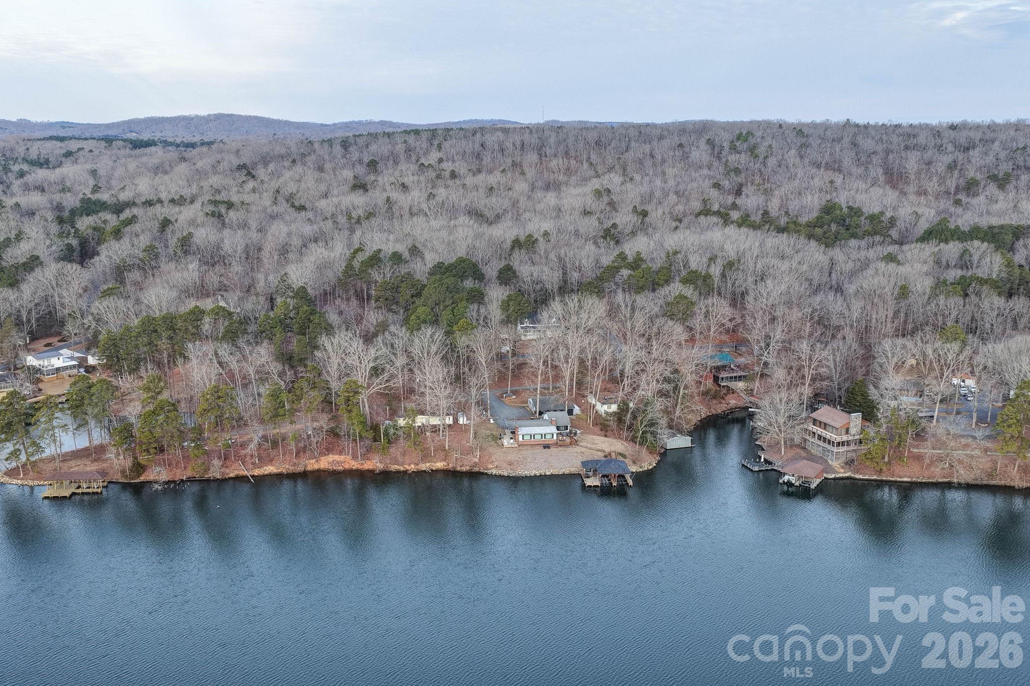 49611 Waterview Trail Albemarle, NC 28001 - Photo 8 of 22 a view of a lake with mountain