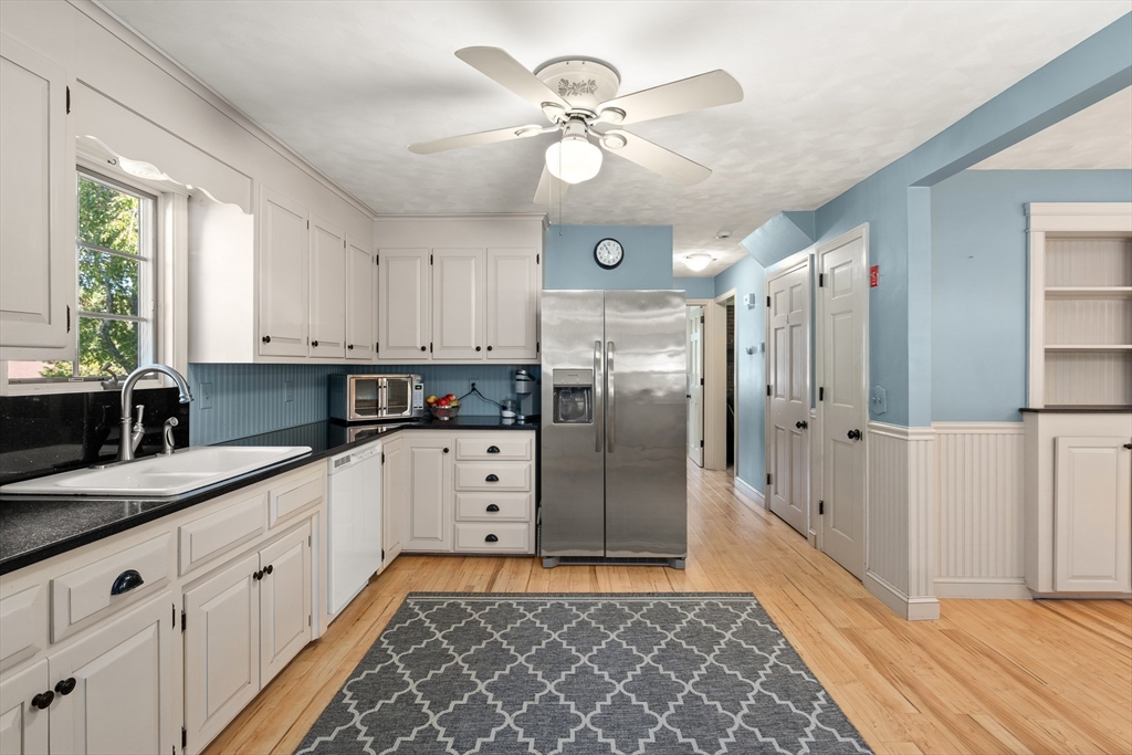 63 Pomeroy Street Easthampton, MA 01027 - Photo 13 of 42 a kitchen with cabinets and window