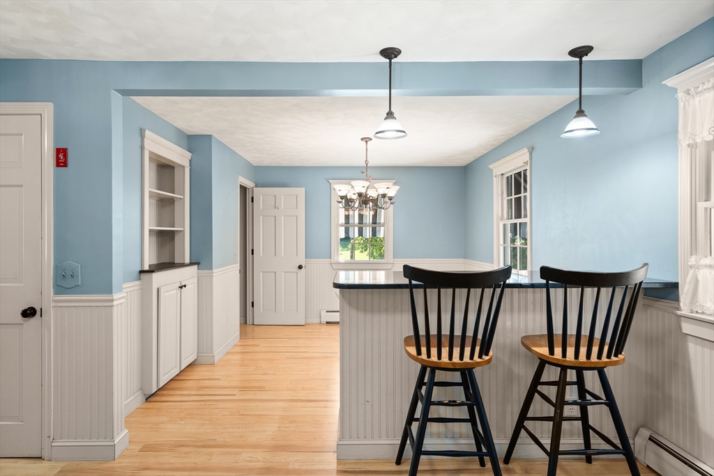 63 Pomeroy Street Easthampton, MA 01027 - Photo 17 of 42 a view of a dining room with furniture window and wooden floor