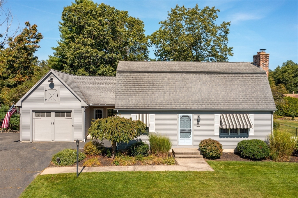 63 Pomeroy Street Easthampton, MA 01027 - Photo 2 of 42 a view of a house with a yard