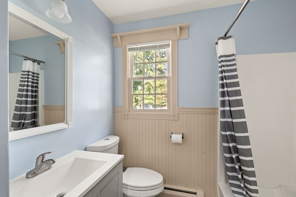 63 Pomeroy Street Easthampton, MA 01027 - Photo 29 of 42 a bathroom with a sink a toilet and shower