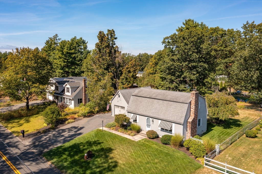 63 Pomeroy Street Easthampton, MA 01027 - Photo 3 of 42 an aerial view of a house with a yard