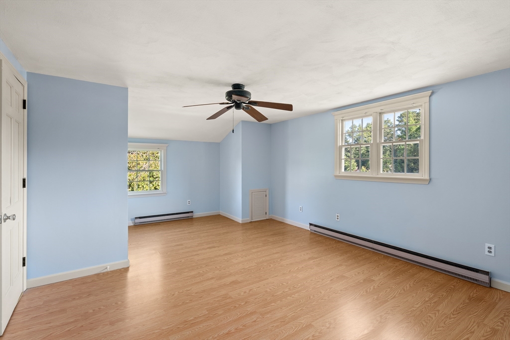 63 Pomeroy Street Easthampton, MA 01027 - Photo 31 of 42 a view of room with window and ceiling fan