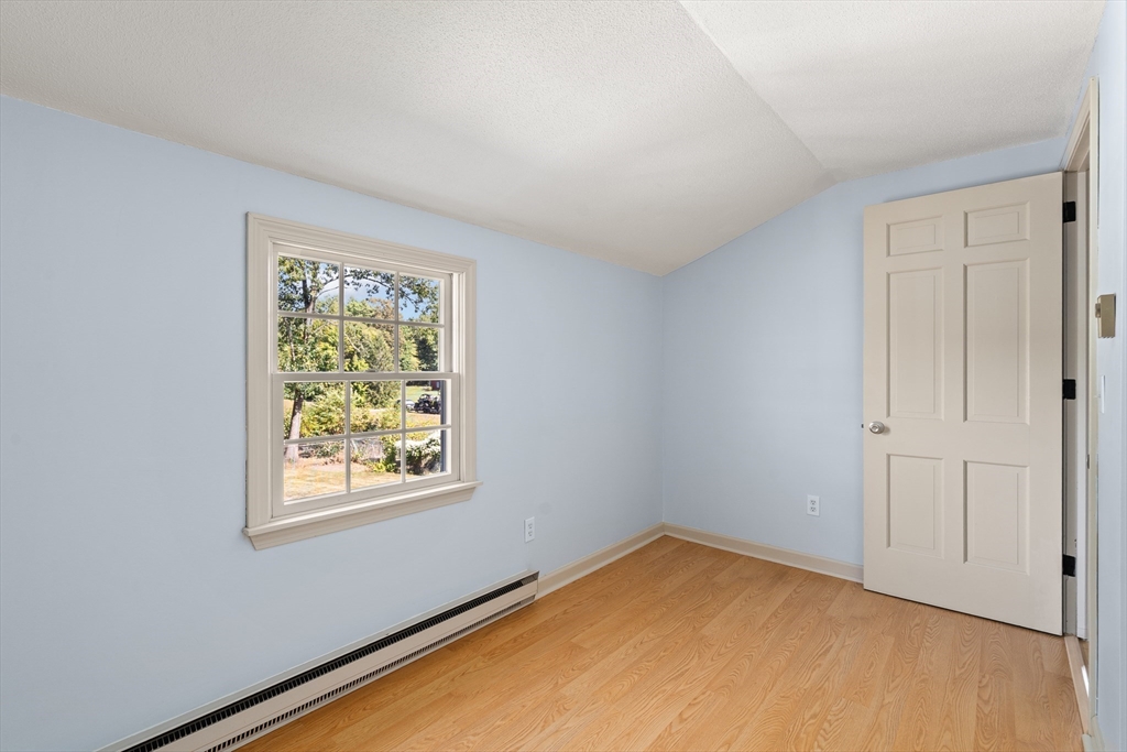 63 Pomeroy Street Easthampton, MA 01027 - Photo 37 of 42 an empty room with windows