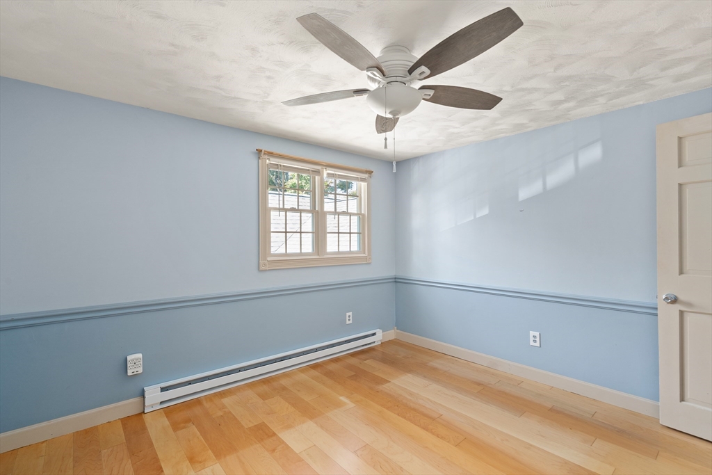 63 Pomeroy Street Easthampton, MA 01027 - Photo 39 of 42 a view of a room with a ceiling fan and a window