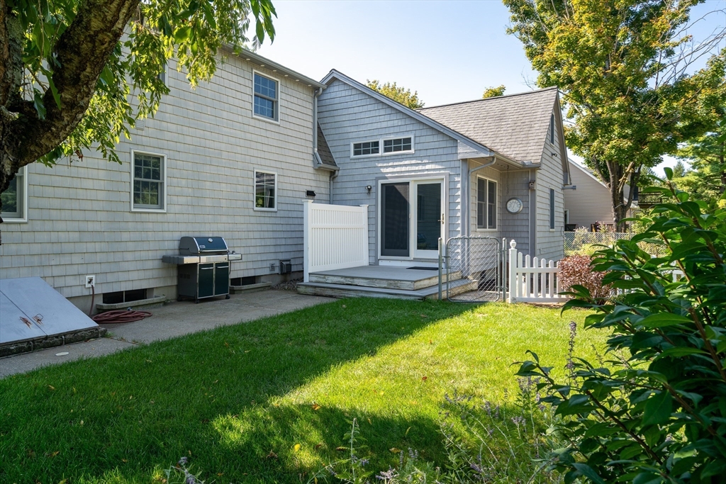 63 Pomeroy Street Easthampton, MA 01027 - Photo 7 of 42 a view of a house with a backyard
