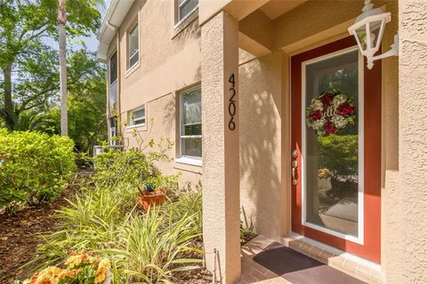 a view of a front door of the house and a street