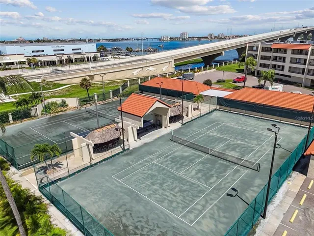 a view of a balcony with an outdoor seating