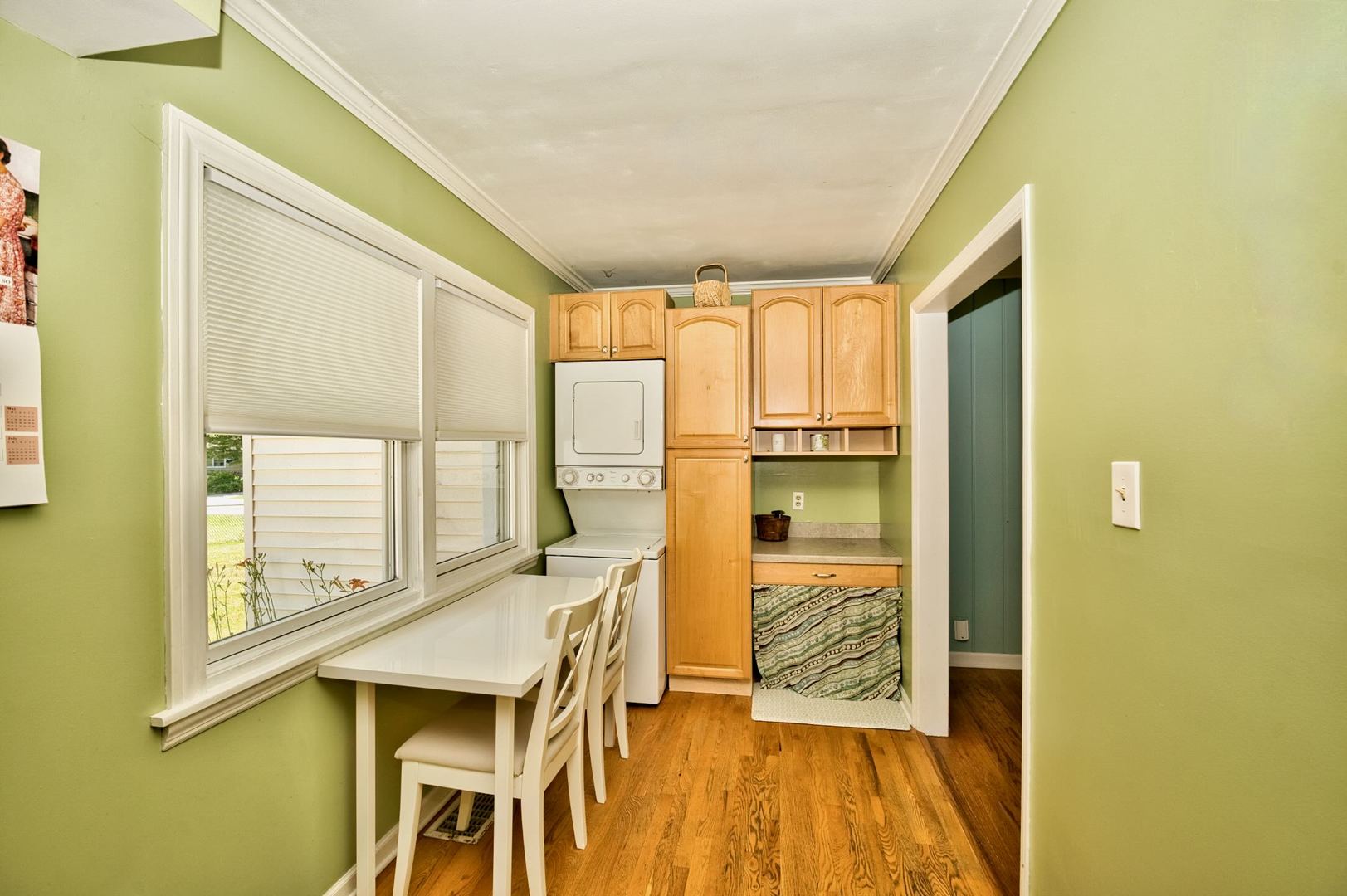 705 Carlisle Road Batavia, IL 60510 - Photo 12 of 25 a workspace with furniture window and wooden floor
