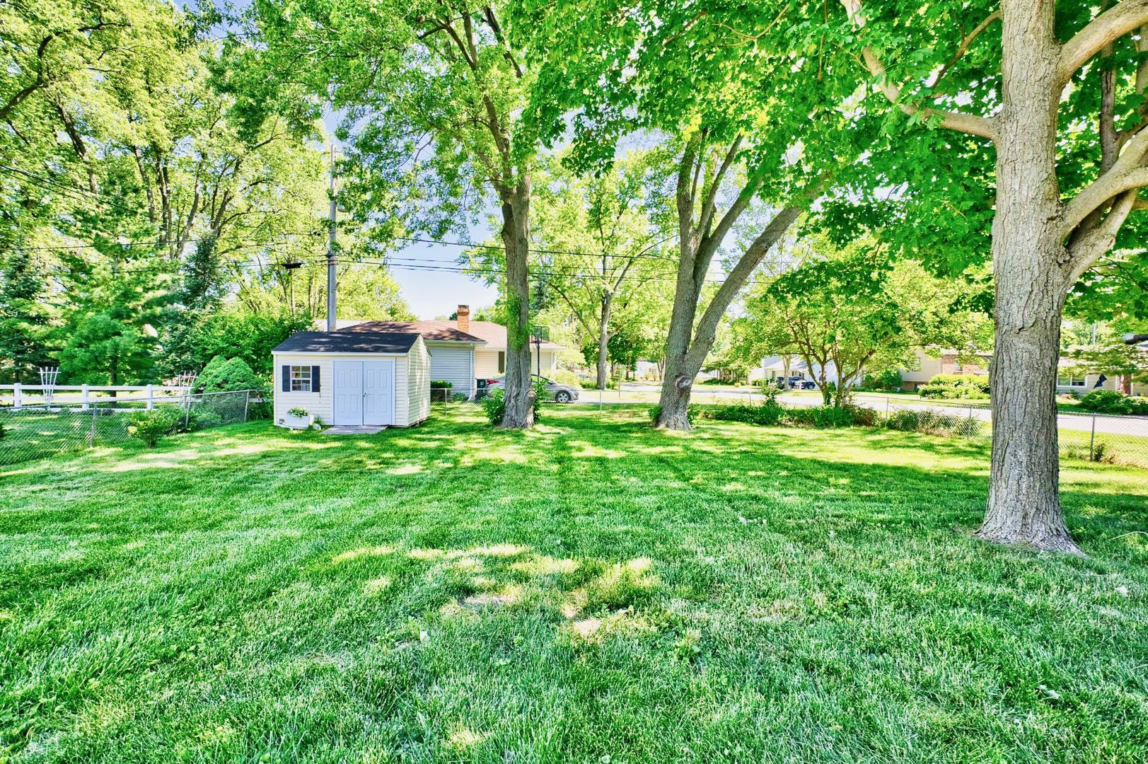 705 Carlisle Road Batavia, IL 60510 - Photo 24 of 25 a view of a garden with trees