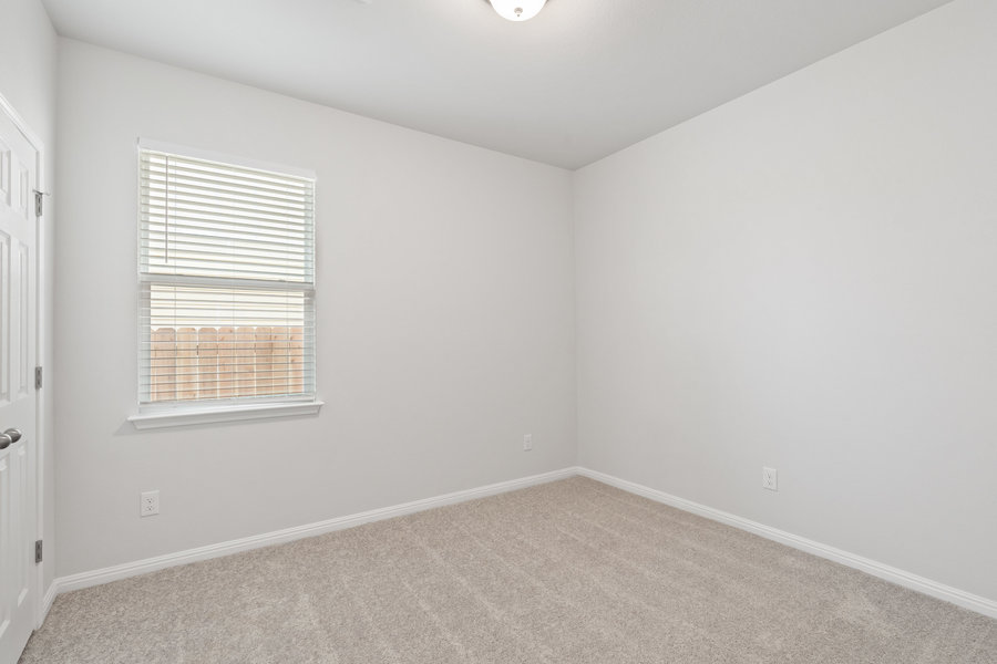 457 Elephant Island Loop Kyle, TX 78640 - Photo 21 of 30 an empty room with a window