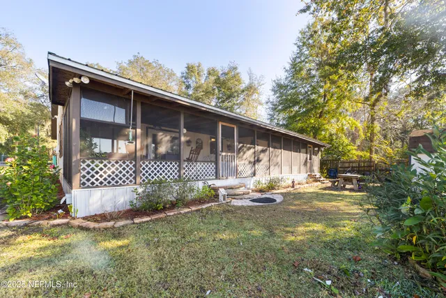 a utility room with closet dryer and washer
