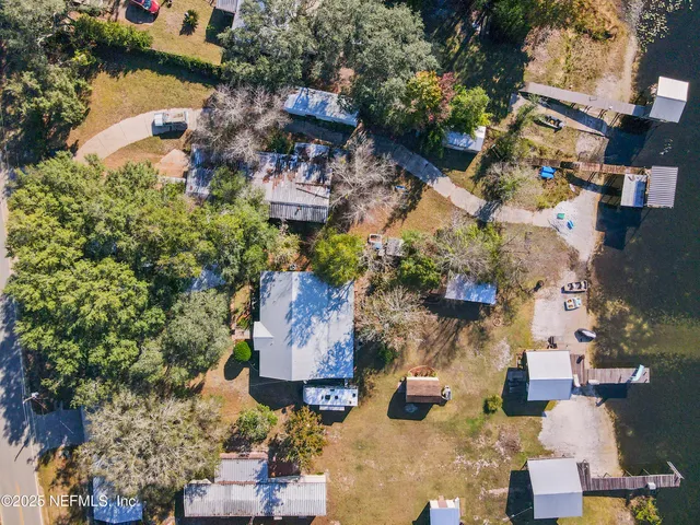 an aerial view of houses with outdoor space