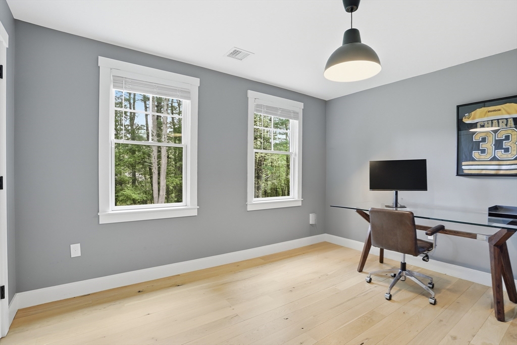 136 Holden Wood Road Concord, MA 01742 - Photo 17 of 31 a workspace with a window and furniture