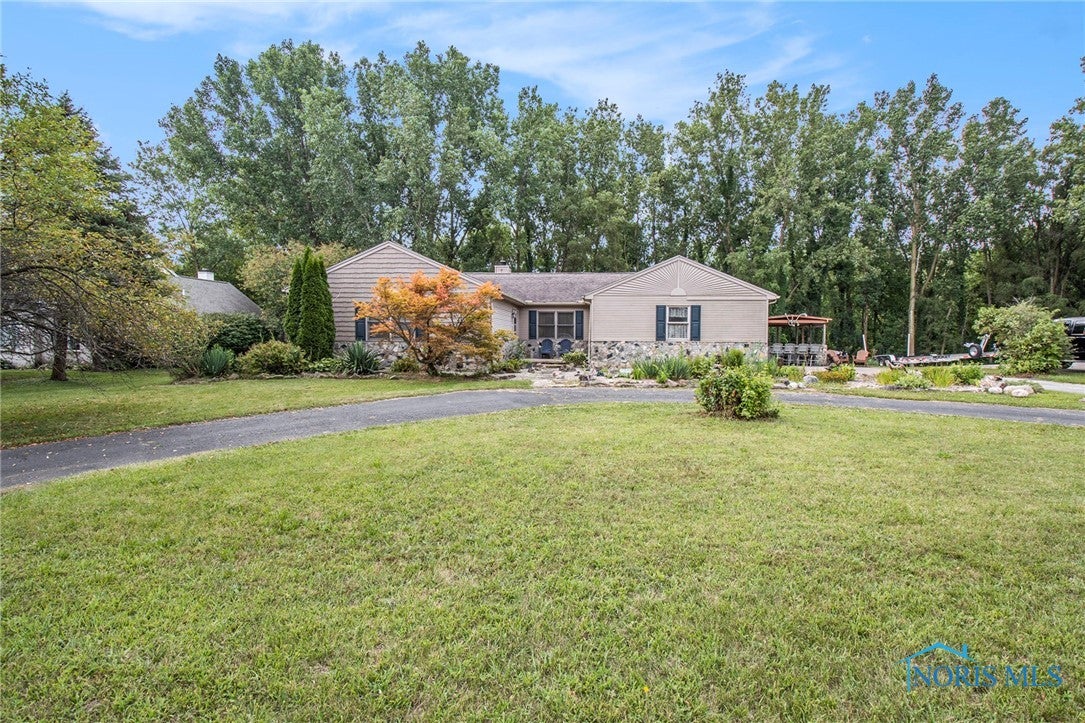 Home offers great privacy sitting back off the road and 1.209 wooded lot