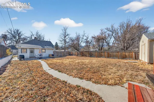 a view of city with tall buildings