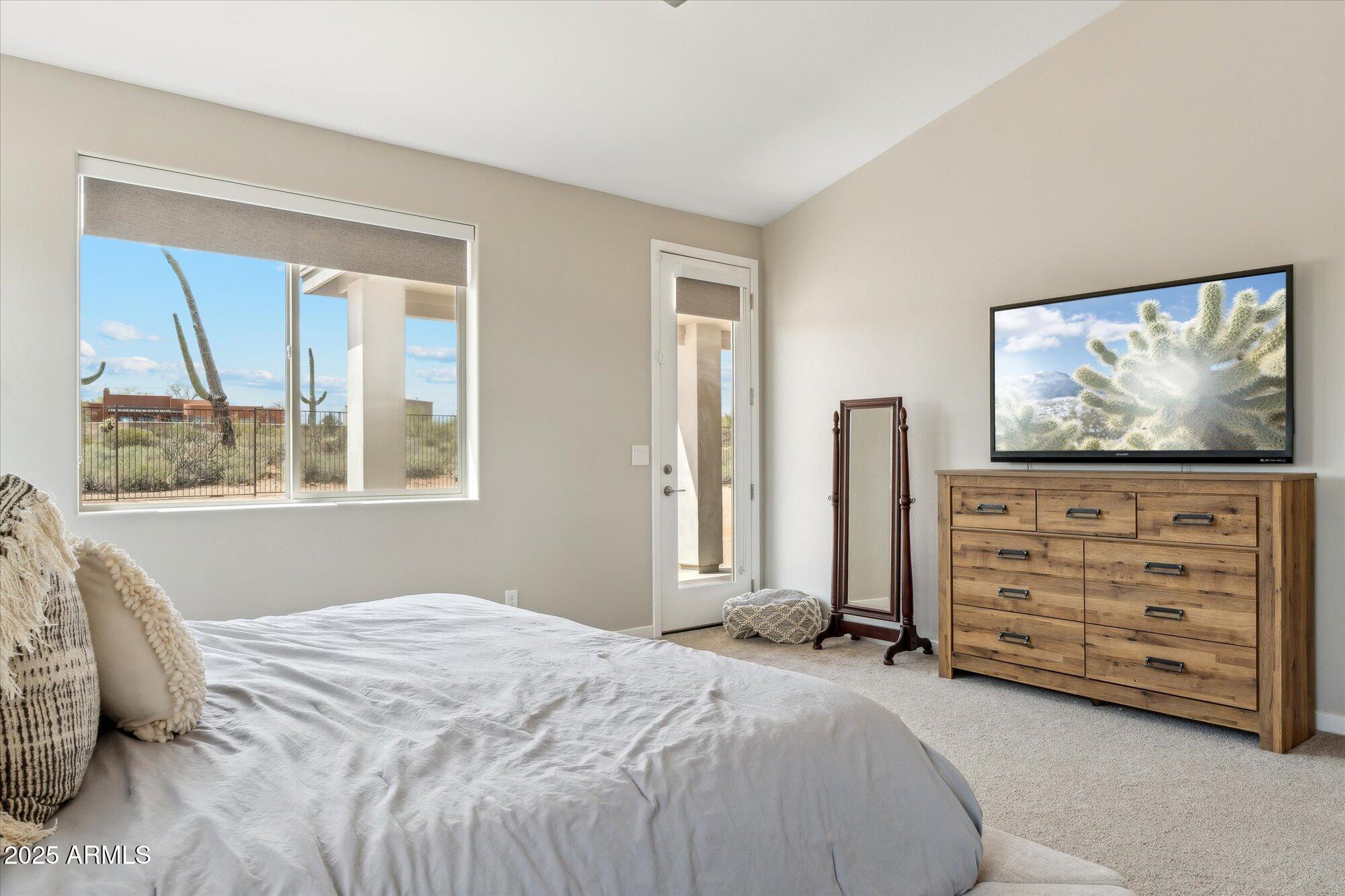 27420 North 170th Street Rio Verde, AZ 85263 - Photo 16 of 39 a bedroom with a bed and a window