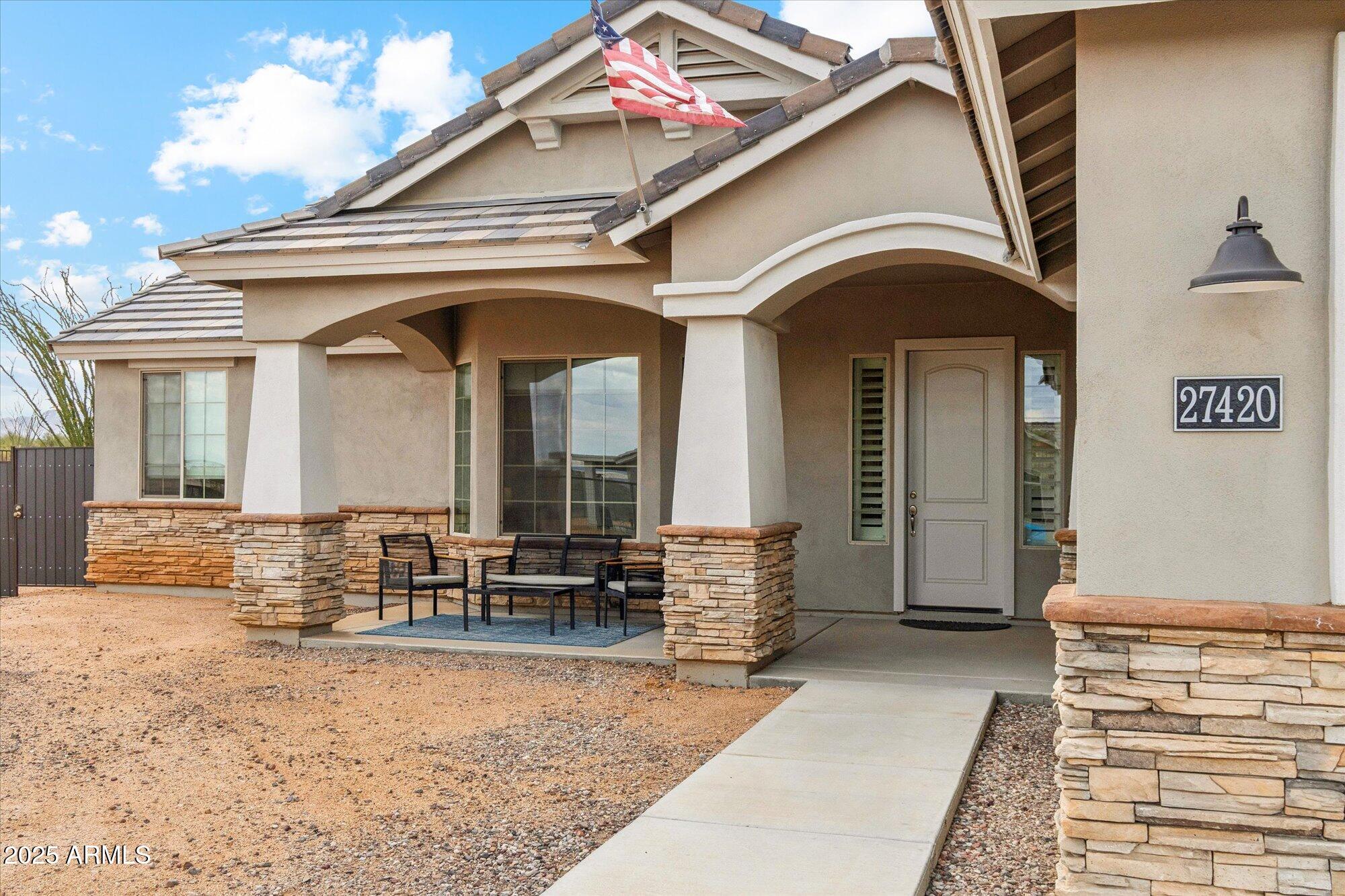 27420 North 170th Street Rio Verde, AZ 85263 - Photo 2 of 39 a view of house with outdoor seating space