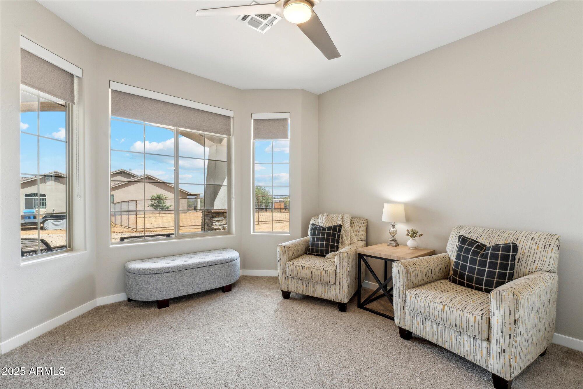 27420 North 170th Street Rio Verde, AZ 85263 - Photo 22 of 39 a living room with furniture and a large window